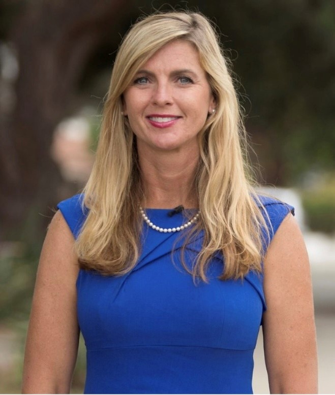 Kelly Long Headshot Blue Dress